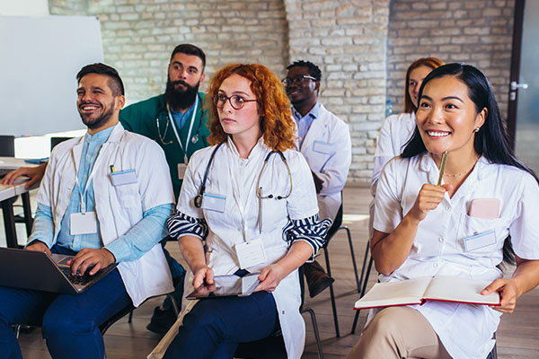 Several nurse anesthesia residents listening to a lecture