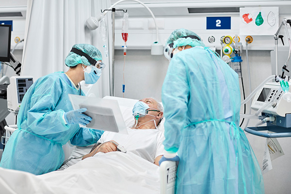 Nurse anesthetist meeting with patient before surgery