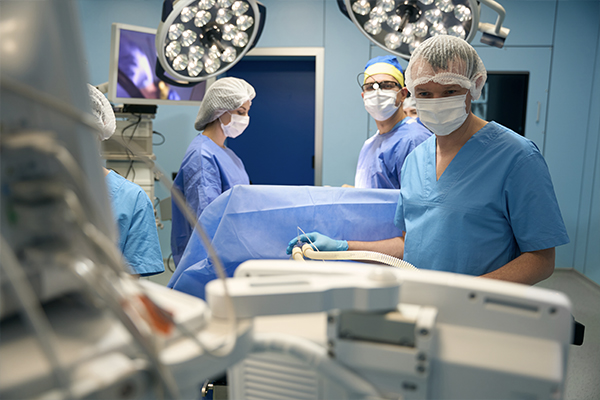 A nurse anesthetist and other medical professionals in the operating room