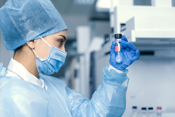 A Nurse Anesthetist prepares anesthesia medications for a patient