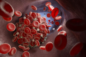 a graphic of red blood cells flowing through an artery